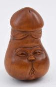 PENIS-NETSUKE, handgeschnitztes Sandelholz, Japan 20. Jahrhundert Miniatur- Penis mit Gesicht und