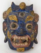 Maske des Schutzgottes BHAIRAVA, Holz, Nepal/Tibet 20. Jahrhundert. Geschnitzte und polychrom