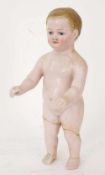 ANTIQUE PORCELAIN FIGURE Beschreibung Antique porcelain figure modelled as a baby, 12 x 28 cm.