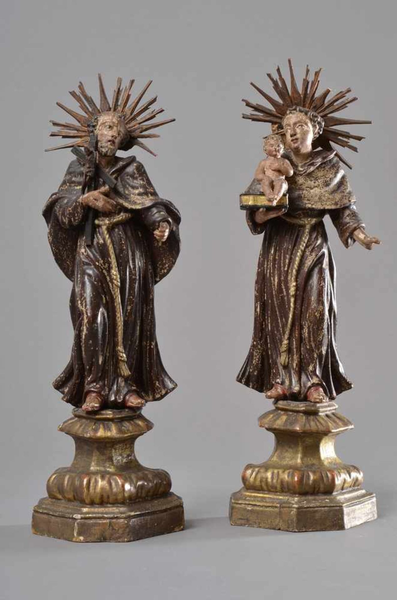 Paar Heiligenfiguren "Heiliger Antonius" und "Heiliger Franziskus", H. 35/33,5cm, Holz gefasst, z.T.