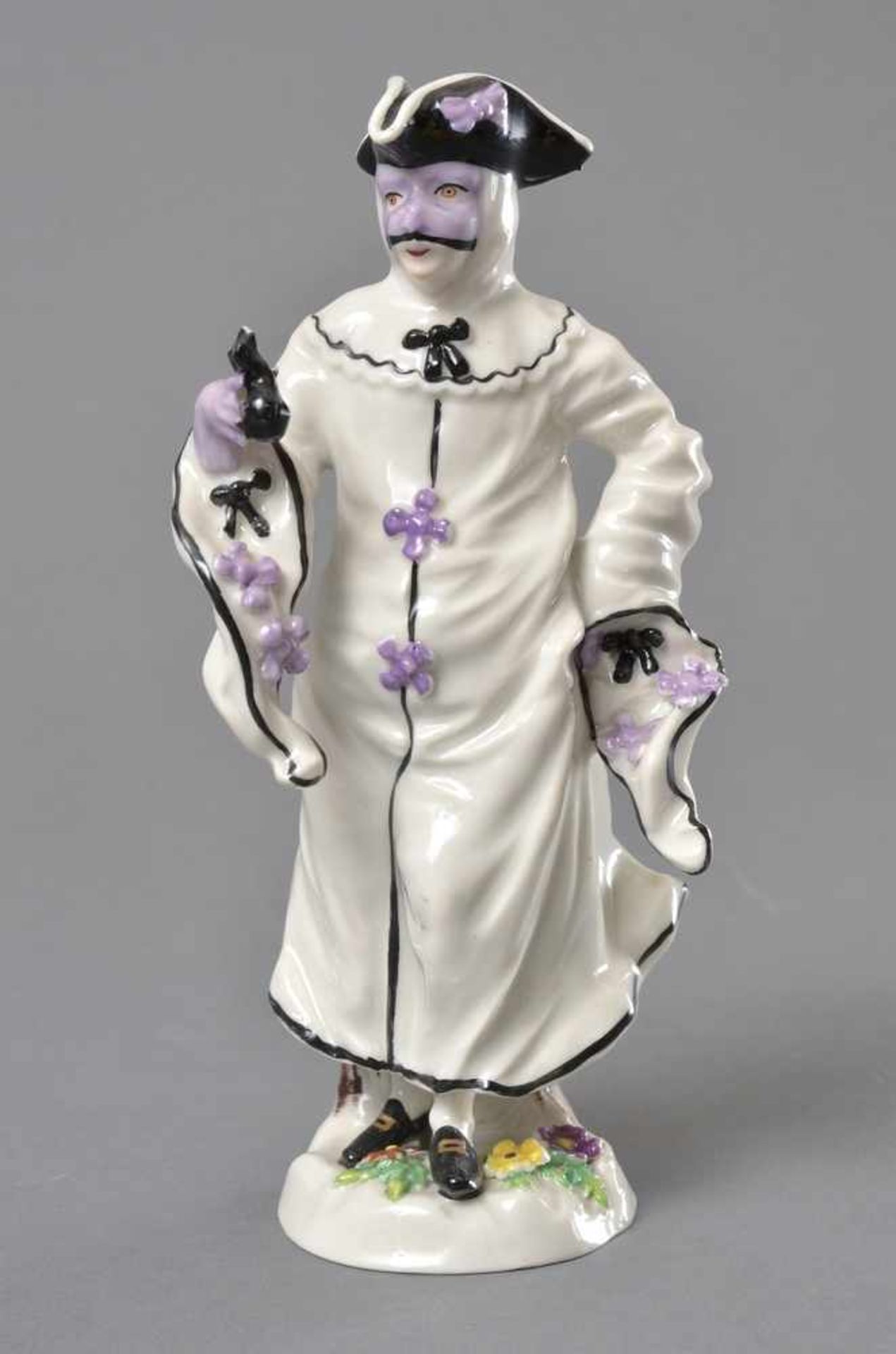 Porzellan Figur "Maskierter Mann" auf naturalistischem Sockel, Aufglasurblaue Capo die Monte (