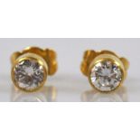 PAAR OHRSTECKER 2 Solitärbrillanten gesamt 0,6ct, w, si, gefasst in Gelbgold 18ct, sehr gut erhalten