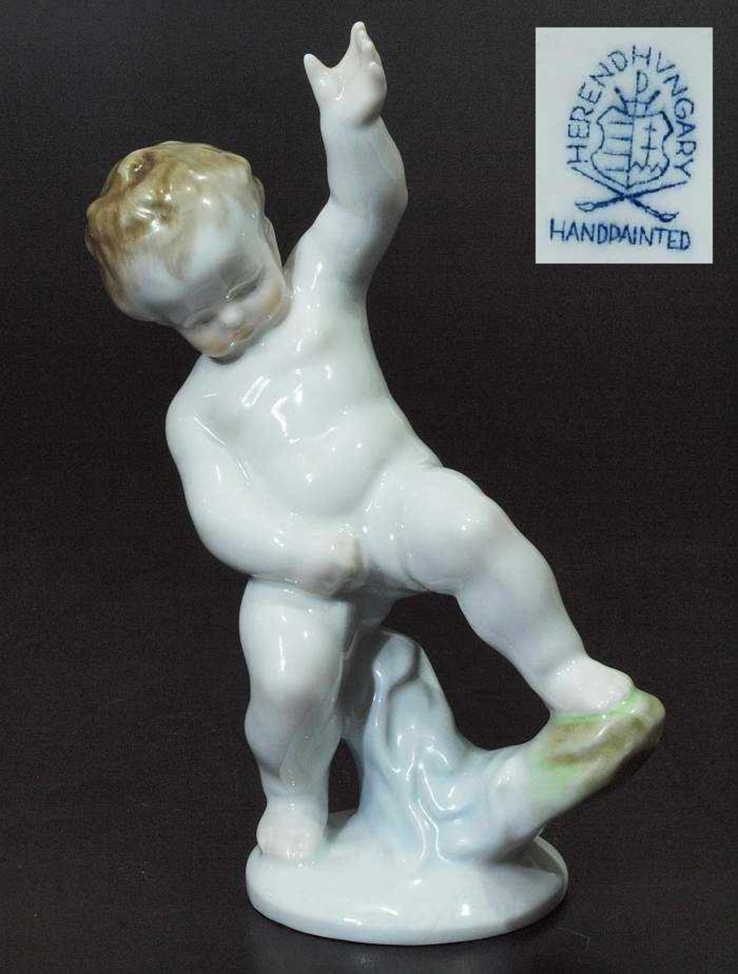 Putto. HEREND. Putto. HEREND/Ungarn, um 1920. Entwurf Nemes György. Weißporzellan, dezent farbig