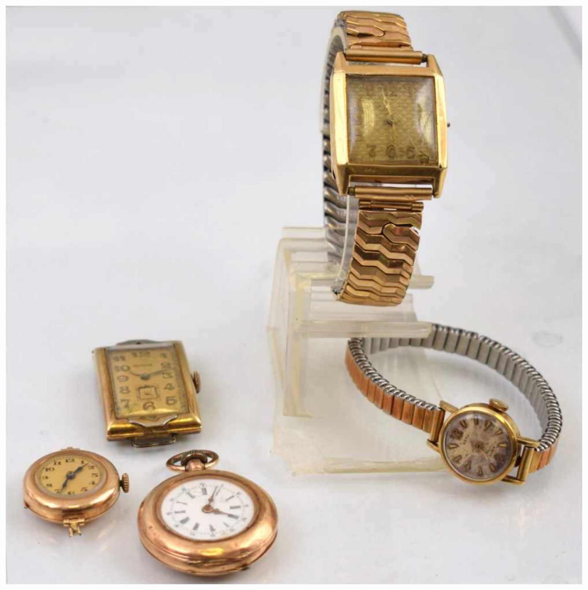 Konvolut fünf Uhren 14 kt. Gelbgold, zwei Taschenuhren, eine Herren- und zwei Damenarmbanduhren,