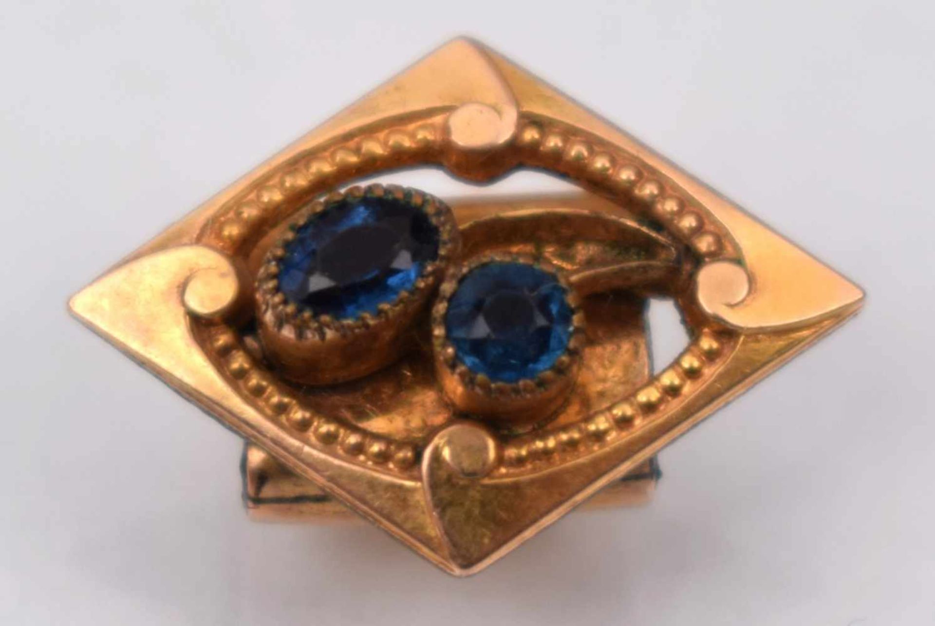 Uhrkettenschieber Dublee, mit zwei blauen Steinen, um 1900