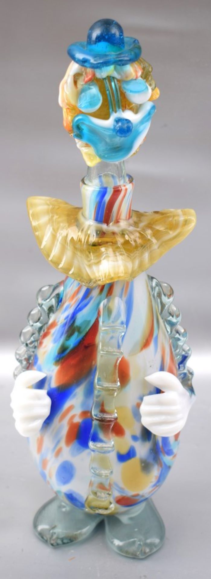 Karaffe in Form eines Clowns, farbl. Glas, mit bunter Farbeinschmelzung, H 32 cm, FM Murano