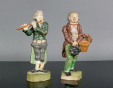 2 Zizenhausener Terrakottafiguren (19.Jh.) 1x Figur aus dem großen Orchester; kalte Bemalung; besch.