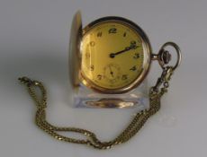 Savonette (um 1930) mit Uhrenkette (14ct GG); Gehäuse mit Front- und Rückendeckel in 14ct GG;