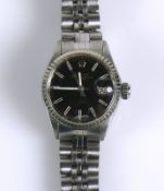 ROLEX-Damenarmbanduhr Oyster Perpetual Date; Stahl; schwarzes Ziffernblatt mit Datumsanzeige;