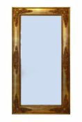 Wandspiegel (Ende 19.Jh.) rechteckige Form; breiter, verg. Rahmen mit floralem Reliefdekor; 137,5