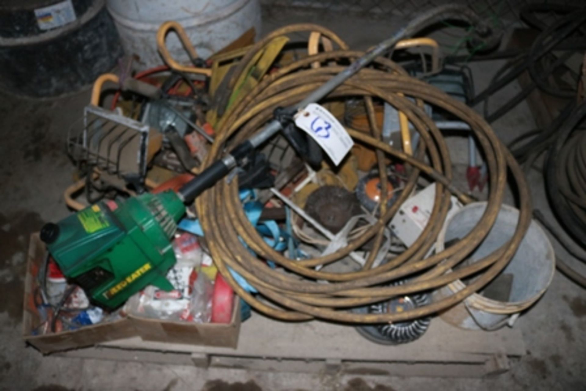 Pallet of misc cords - lights - weed eater