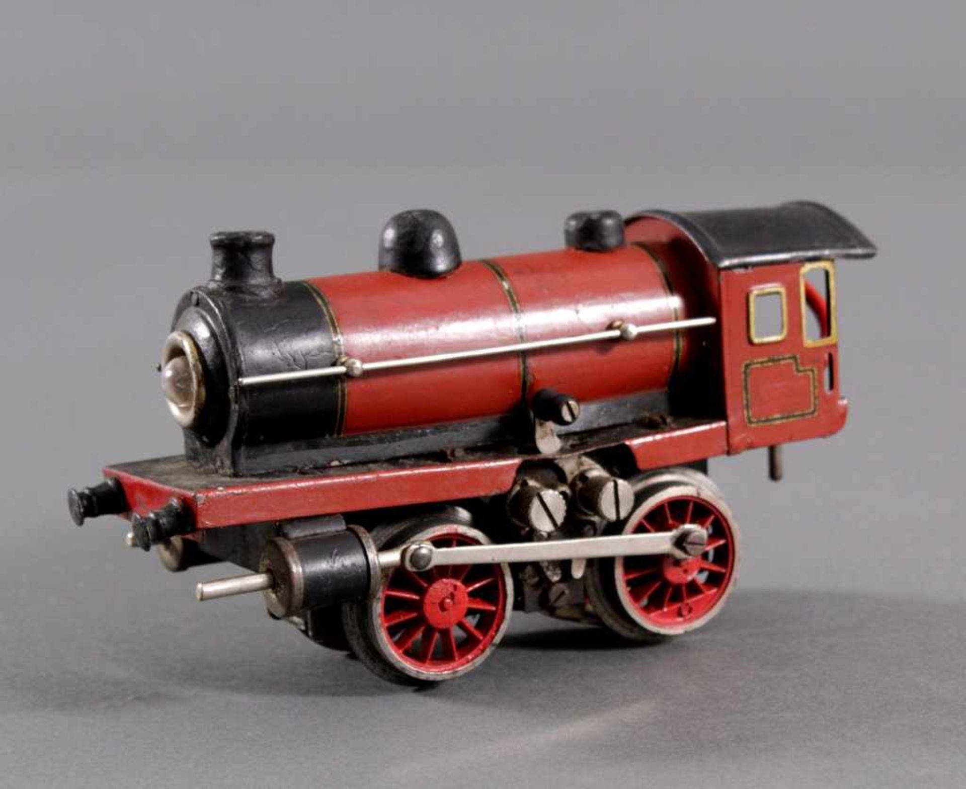 Märklin Lok Spur 0, vor 1929rot/schwarz, ca. L- 16 cm. Altersgemäße Gebrauchsspuren.