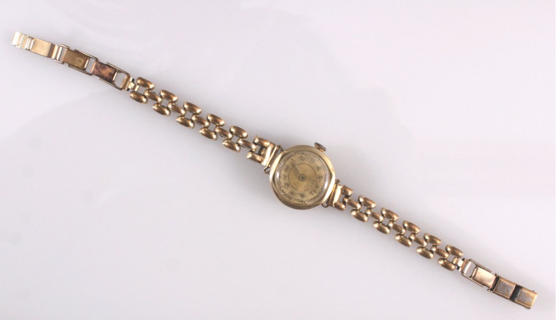 Antike DamenarmbanduhrGehäuse 8 kt Gelbgold, vergoldetes Gliederarmband, ohneFunktion, Arabische