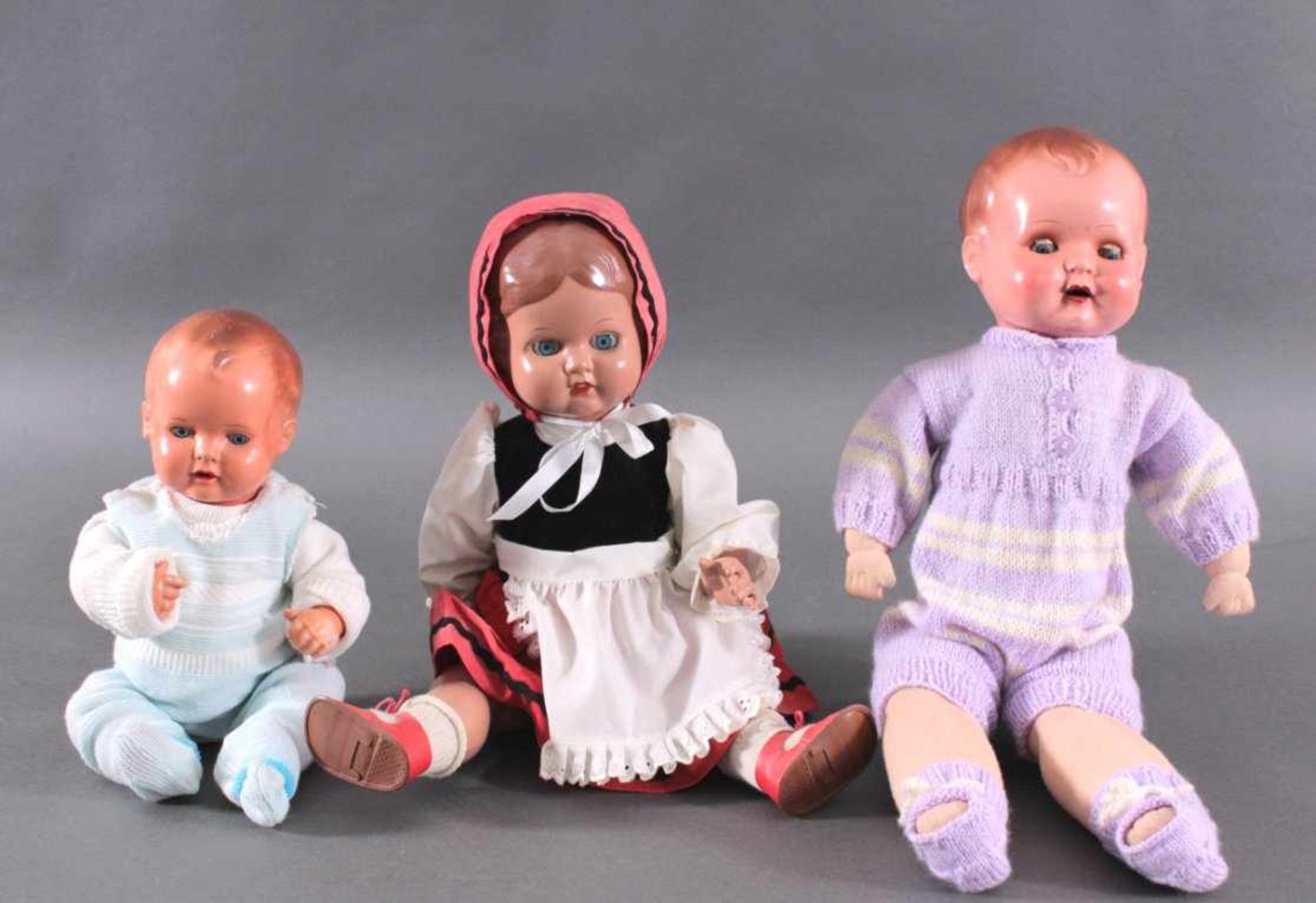 3 Schildkröt Puppen1 Mädchen, gemarkt REP 49 und Schildkröte in Raute, ca.H- 49 cm.1 Baby mit