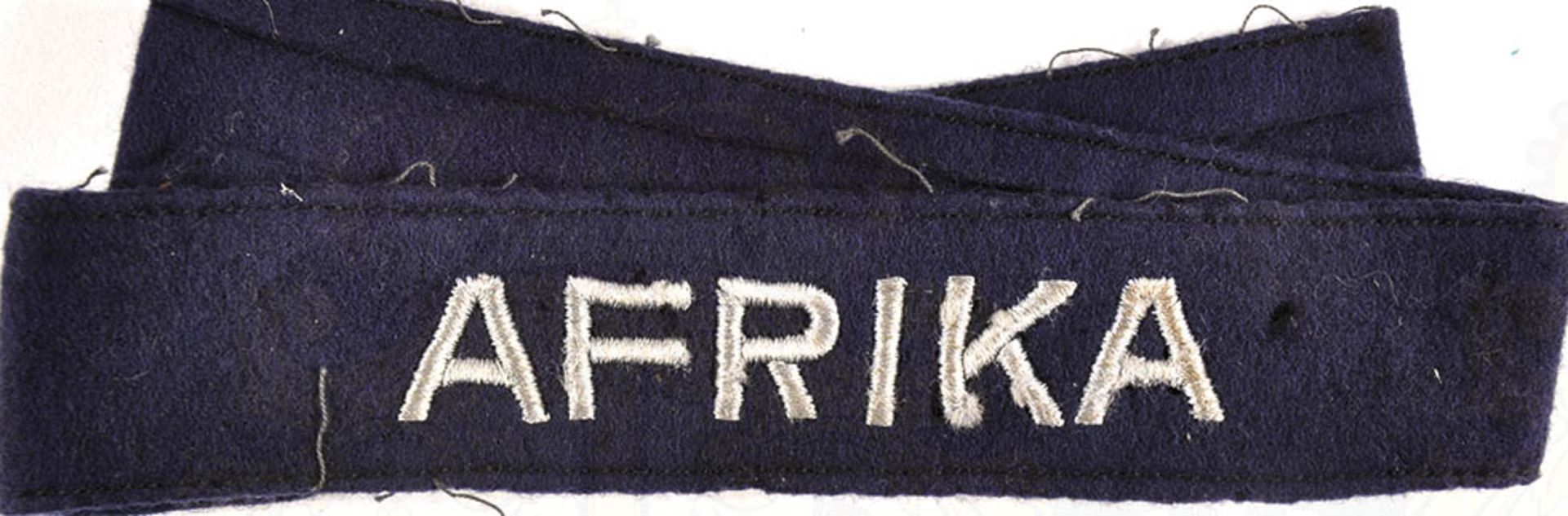 ÄRMELBAND "AFRIKA", (Zugehörigkeitsband f. LW-Angehörige), dunkelblaues Tuch m. silbergrauer
