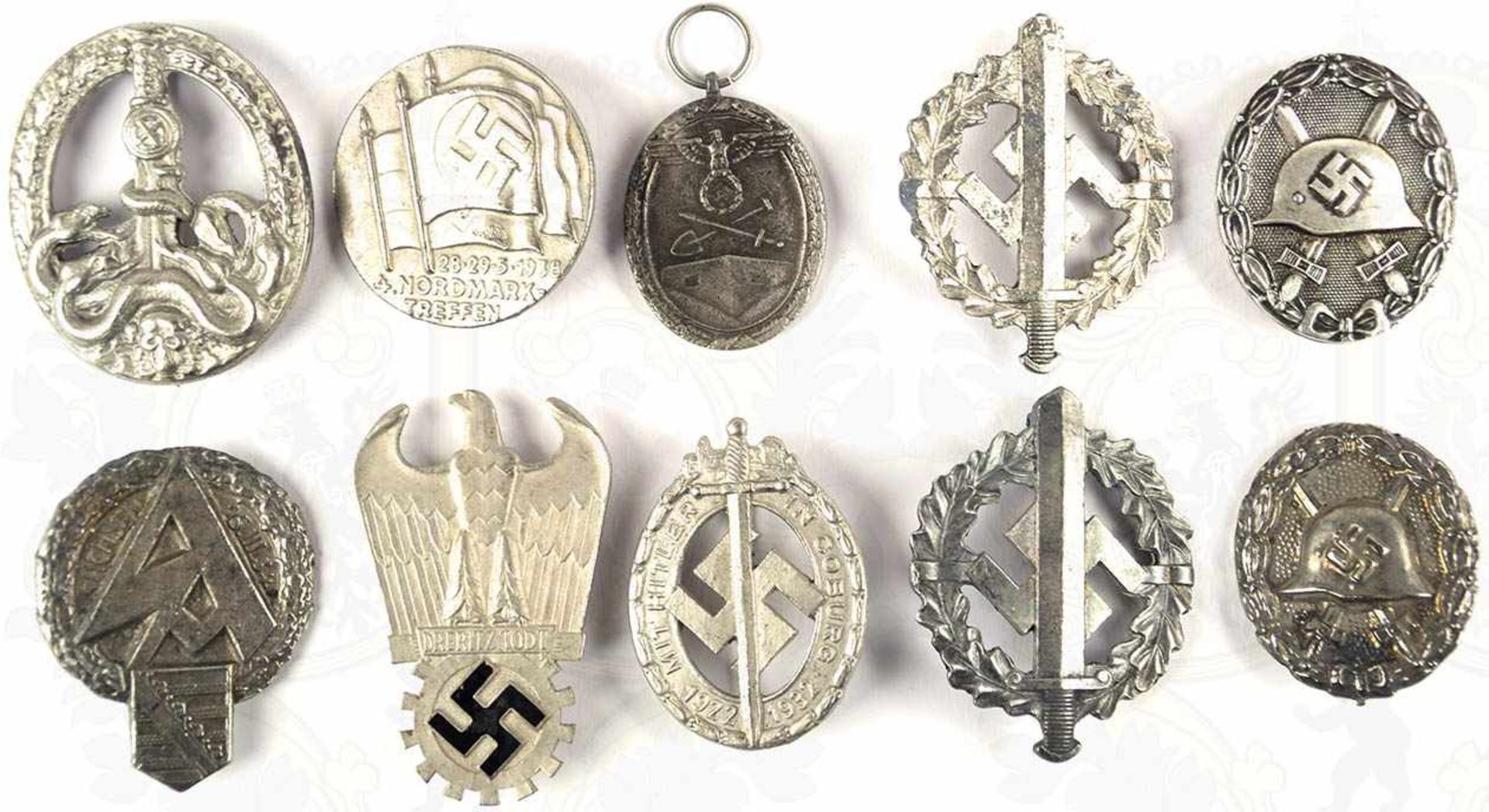 10 EHRENZEICHEN, dabei: 2x Wehrabzeichen der SA; Verwundeten-Abz. in Silber u. in Schwarz;