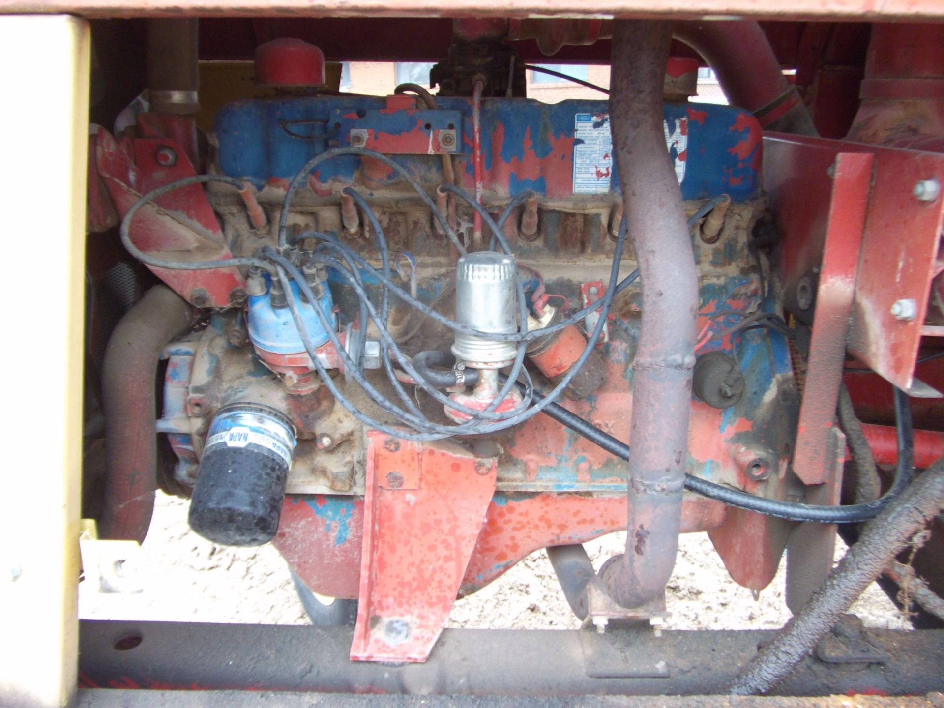 N H 1112 swather 14' head and cond. Cab, gas engine - Image 7 of 7