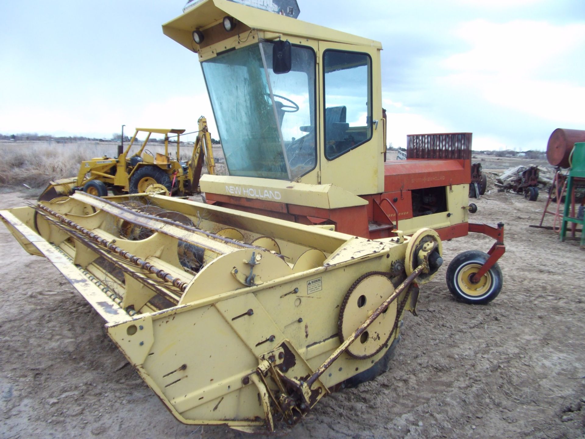 N H 1112 swather 14' head and cond. Cab, gas engine - Image 3 of 7