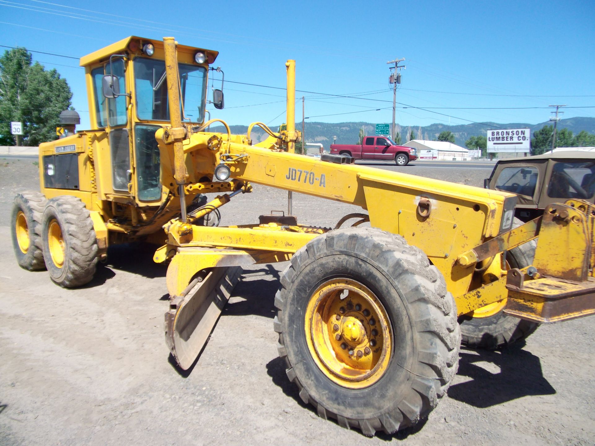 John Deere 770 A road grader 12', 2500 hrs on new engine, 6400 hrs total