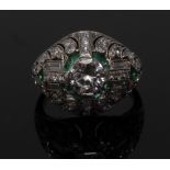 An Art Deco diamond and emerald cluster ring, central round brilliant cut diamond approx 1.