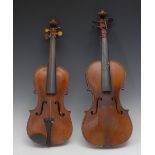 A violin, the two-piece back 36cm long excluding button, ebony tuning pegs,