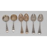 A composed pair of George III Old English pattern 'berry' spoons,