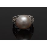A cultured mabe pearl solitaire ring, grey cream tones, white metal rope twist shank, size L, 6.