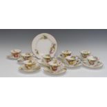 A Royal Worcester part tea service, comprising nine teacups, nine saucers, one side plate,