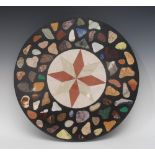 A pietra dura circular table top, the centre inlaid with an eight-pointed star,