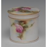 A Royal Worcester cylindrical trinket jar and cover, painted with pink cabbage roses,