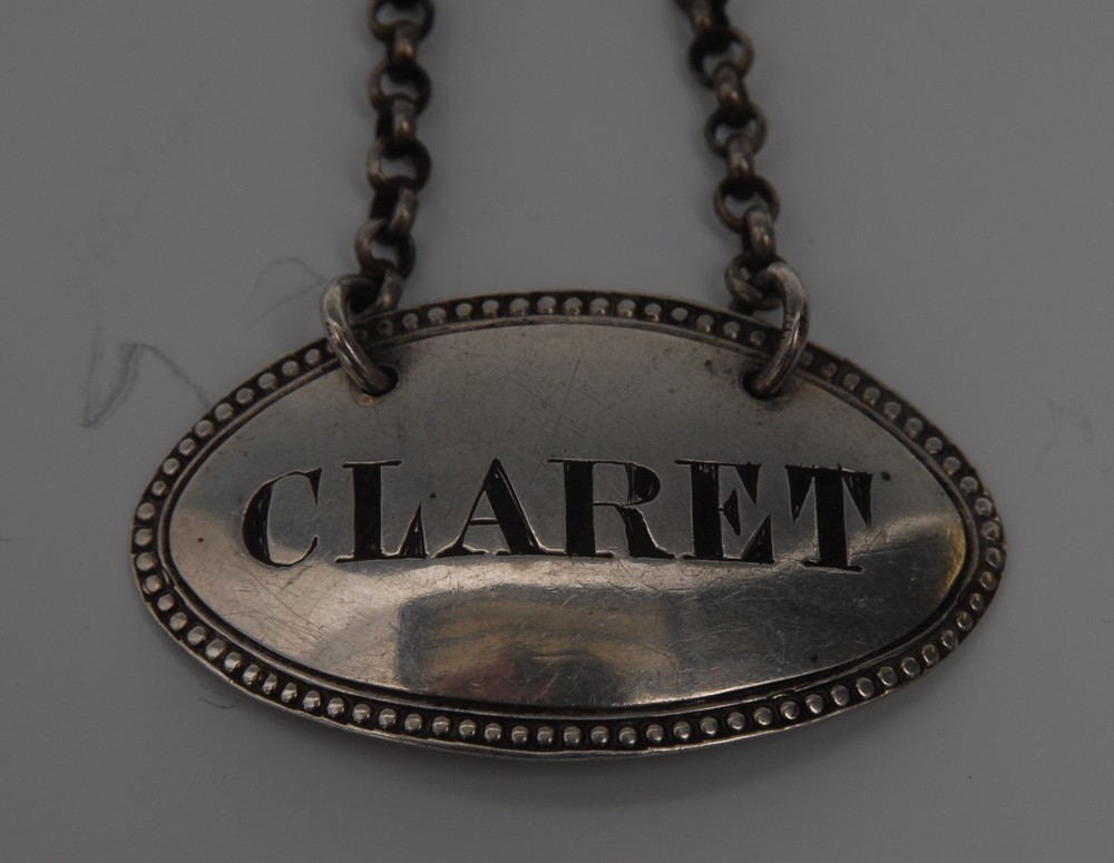 A Victorian silver oval wine label, Claret, engraved lettering, beaded border, 4.