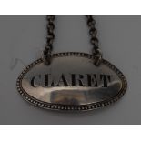 A Victorian silver oval wine label, Claret, engraved lettering, beaded border, 4.