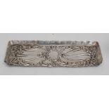 An Edwardian silver rounded rectangular dressing table trinket tray, wavy border,