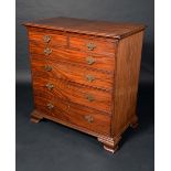 A George III mahogany chest of two short and four long graduated cockbeaded drawers,