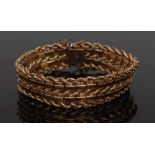 A Chilean 14ct gold rope and bar articulated fancy link bracelet, compression clasp,