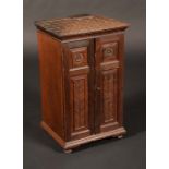 A Victorian Aesthetic Movement collector's specimen cabinet,