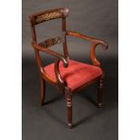 A Regency rosewood and brass marquetry elbow chair,