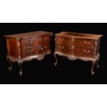 A near pair of Chippendale Revival mahogany serpentine commodes,