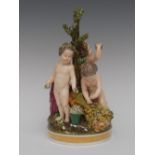 A Derby figure group, The Four Seasons, with four cherubs, Spring with flower posy, Summer,