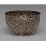 A Victorian silver circular sweetmeat bowl, chased with birds and scrolling foliage,