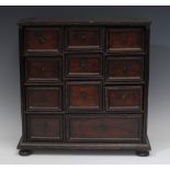 A 'Charles II' oak spice or table cabinet,