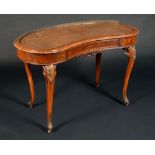 A Victorian gilt-metal mounted burr walnut kidney-shaped writing table, pierced brass gallery,