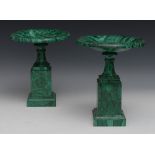 A near pair of Neo-Classical malachite saucer shaped pedestal mantel tazzas,