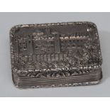 A George IV silver rounded rectangular castle top vinaigrette, hinged cover,