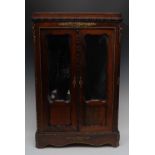 Miniature Furniture - an early 19th century French gilt metal mounted rosewood diminutive armoire,