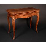 A 19th century rosewood serpentine card table, folding top above a deep frieze, cabriole legs, c.