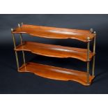 A set of 19th century mahogany three-tier wall shelves, shaped serpentine plateaux,