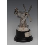 A George VI silver presentation model, as a windmill, the sails rotating, ebonised base,
