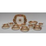 A 19th century Coalport part tea service, painted with roses,