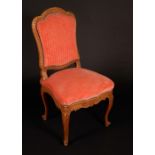 A Louis XV design beech side chair, acanthus cresting, stuffed-over upholstery,